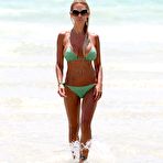 First pic of Busty Shauna Sand sexy in green bikini on the beach in Miami