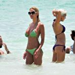 Second pic of Busty Shauna Sand sexy in green bikini on the beach in Miami