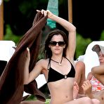 First pic of Emma Watson on the beach in the Caribbean