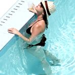Third pic of Katy Perry wearing a black bikini at a hotel pool in Miami