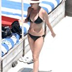 Fourth pic of Katy Perry wearing a black bikini at a hotel pool in Miami