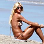 Second pic of Victoria Silvstedt in leopard bikini on a beach