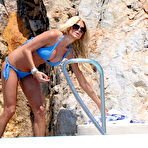 Third pic of Victoria Silvstedt shows cleavage in blue bikini in Antibes
