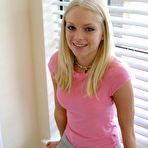 Second pic of Super cute Skye poses for pictures in a tight pink shirt and grey sweat capris