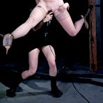 Fourth pic of SexPreviews - Hazel Hypnotic is rope bound wearing high heels in dark dungeon