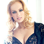First pic of Andrea Vangel seduces in a black lace bra and panties