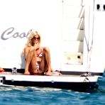 First pic of Victoria Silvstedt side of boob and in bikini paparazzi shots