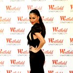 Fourth pic of Nicole Scherzinger posing for paparazzi in tght black dress