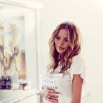 First pic of Amanda Booth posing pregnant at home