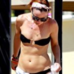First pic of Juliette Lewis in black bikini on the beach in mexico