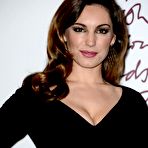 Third pic of Kelly Brook slight clevage in tight dress