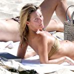 First pic of Kate Moss nipple slip on the beach in St. Barts