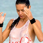 Third pic of Adriana Lima nude tits under see thru wet top