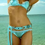 First pic of Veronika Fasterova - Beautiful Veronika Fasterova poses on the beach, slowly taking off her bikini.