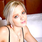 First pic of Juicy Pearl - Juicy Pearl takes her hot black lingerie off on the bed and fingers her wet meat hole
