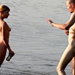 Fourth pic of Nude Beach. Wild couple making a nude beach video