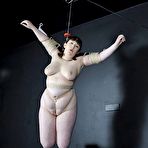 Third pic of NaughtyNimue gets her naked body tied up and hanged with on the air
