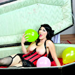 First pic of Busty Vampire Kymberly Jane popping balloons inside her coffin