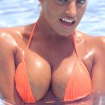 Fourth pic of Trish Stratus showing her magnificent cleavage