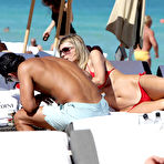 Fourth pic of Rita Rusic boobsliup in red bikini on the beach