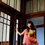 Third pic of Aika Yumeno posing in the living room