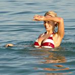 Third pic of Gemma Garrett shows cleavage on the beach paparazzi shots