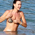 Second pic of Tamara Mellon in bikini and topless on a beach paparazzi shots