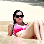 Third pic of Kelly Brook hard nipples and cleavage in bikini on the beach