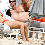 Third pic of Jenny McCarthy cleavage in red bikini on Miami Beach