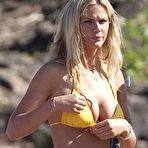 Second pic of Brooklyn Decker shows deep cleavage in yellow bikini on the beach