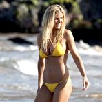 Fourth pic of Brooklyn Decker shows deep cleavage in yellow bikini on the beach