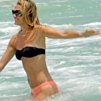 Second pic of Molly Sims shows her her hot ass in bikini at Miami beach