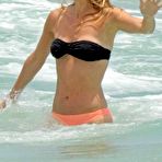 Third pic of Molly Sims shows her her hot ass in bikini at Miami beach