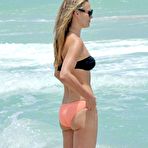 Fourth pic of Molly Sims shows her her hot ass in bikini at Miami beach