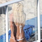 First pic of Victoria Silvstedt hard nipples, cameltoe and cleavage in bikini on the beach
