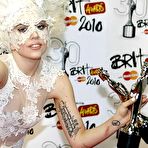 Third pic of Lady Gaga at Brit Awards 2010 in semi-transparent clothing shows nipple slip and ass