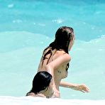 Third pic of Cara Delevingne topless on a beach with Michelle Rodriguez in Mexico