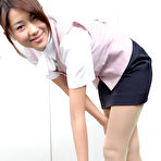 Second pic of Naoho Ichihashi Asian in tight skirt is a very attractive doll
