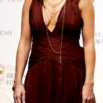 Second pic of Neve Campbell shows cleavage at The BAFTA Awards redcarpet