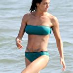 First pic of Asia Argento in blue bikini on the beach with her husband