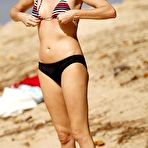 First pic of Charlize Theron in bikini on the beach