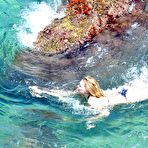 Second pic of Hilary Duff in black bikini candids in Capri