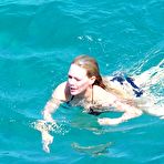 Fourth pic of Hilary Duff in black bikini candids in Capri