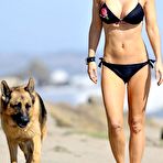 Second pic of Kelly Carlson sexy in bikini on the beach with her dog