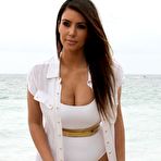 First pic of Kim Kardashian in white bikini on the beach