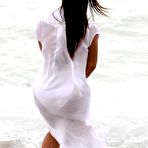 Third pic of Kim Kardashian in white bikini on the beach