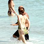 First pic of Lily Cole nipple slip on a yacht in St. Barts