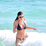 First pic of Lisa Snowdon in various bikinies on the beach
