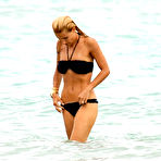 Fourth pic of Michelle Hunziker caught in black bikini on the beach