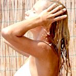 Fourth pic of Michelle Hunziker in bikini on the beach paparazzi shots